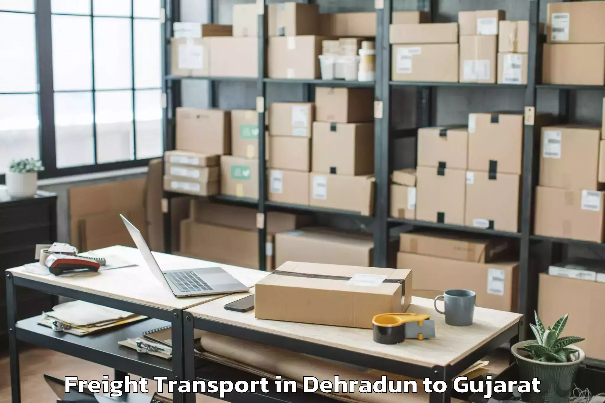 Book Dehradun to Kundla Freight Transport